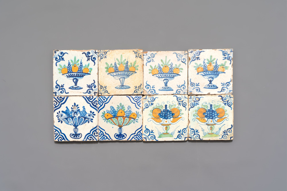 Eight blue, white and polychrome Dutch Delft 'fruit basket' tiles, ca. 1600
