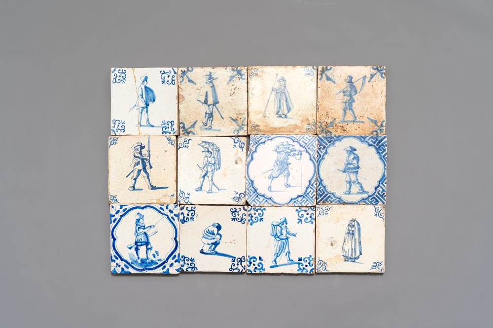 12 blue and white Dutch Delft tiles with large figures, 17th C.