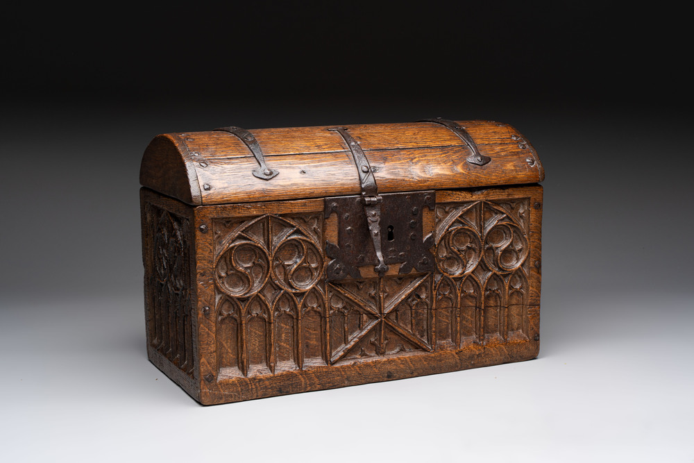 A Gothic Revival oak casket with wrought-iron mounts, 19th C.