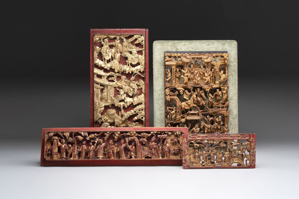 Four Chinese gilt-lacquered carved wooden panels with narrative design, 19th C.