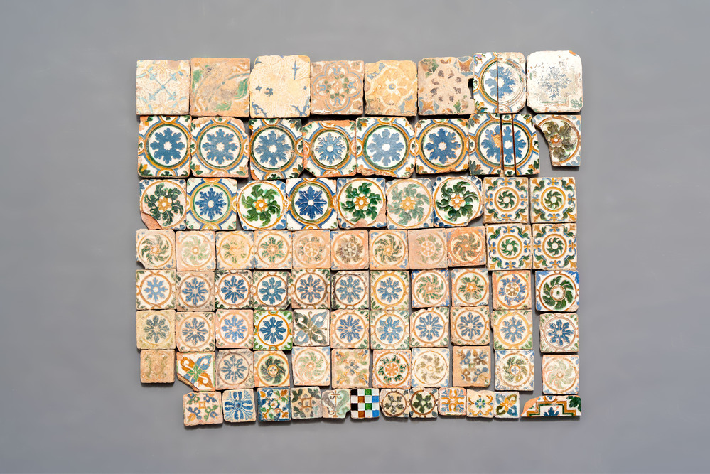 A varied collection of 84 polychrome Spanish tiles with floral design, 15/17th C.