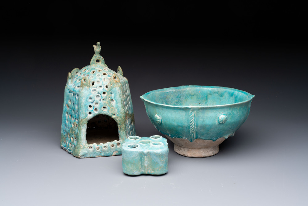 A Nishapur turquoise-glazed bowl, an inkwell and an incense burner or lantern, Iran, 10/12th C.