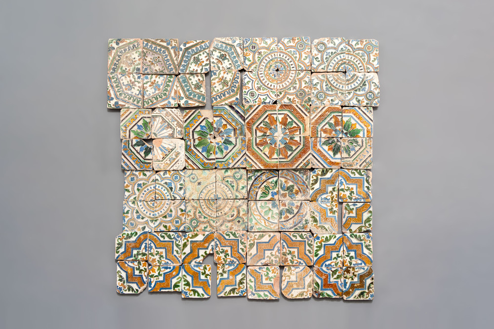 A varied collection of 64 polychrome tiles, Spain, 16th C.