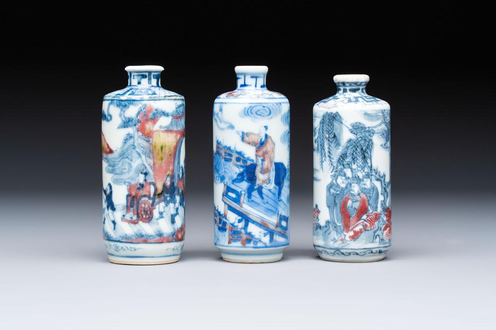Three Chinese blue, white and copper-red snuff bottles, 19th C.