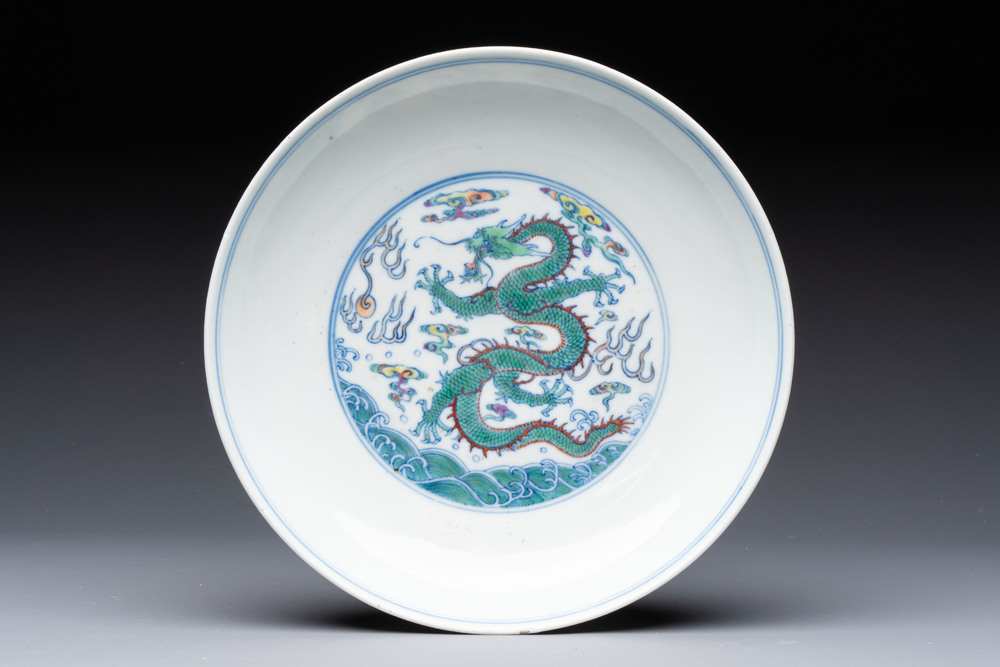A Chinese doucai 'dragon' plate, Yongzheng mark and of the period