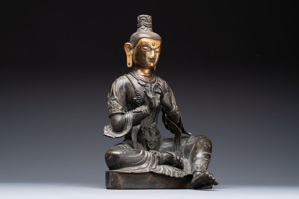 A Sino-Tibetan parcel-gilt-bronze figure of a Bodhisattva, 19/20th C.