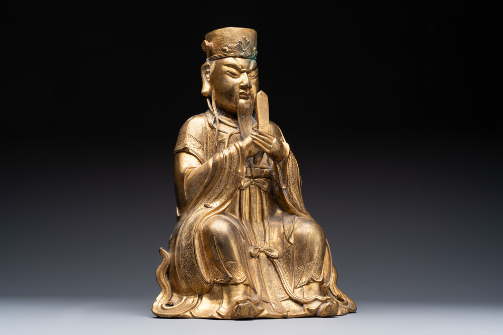 A Chinese gilt-bronze figure of Wenchang Wang, possibly Ming