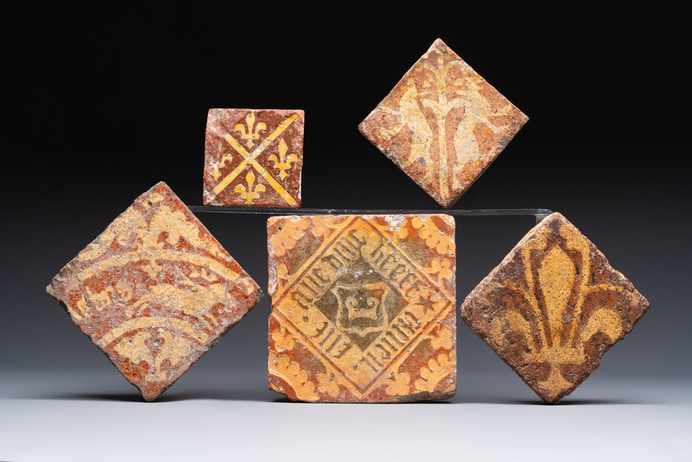 Five medieval slip-decorated tiles, France, Flanders and England, 15/16th C.