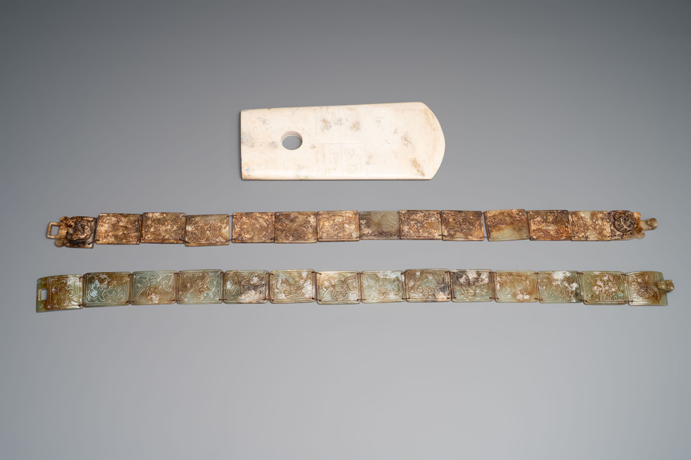 Two Chinese jade belts and a archaistic jade ritual axe, 20th C.