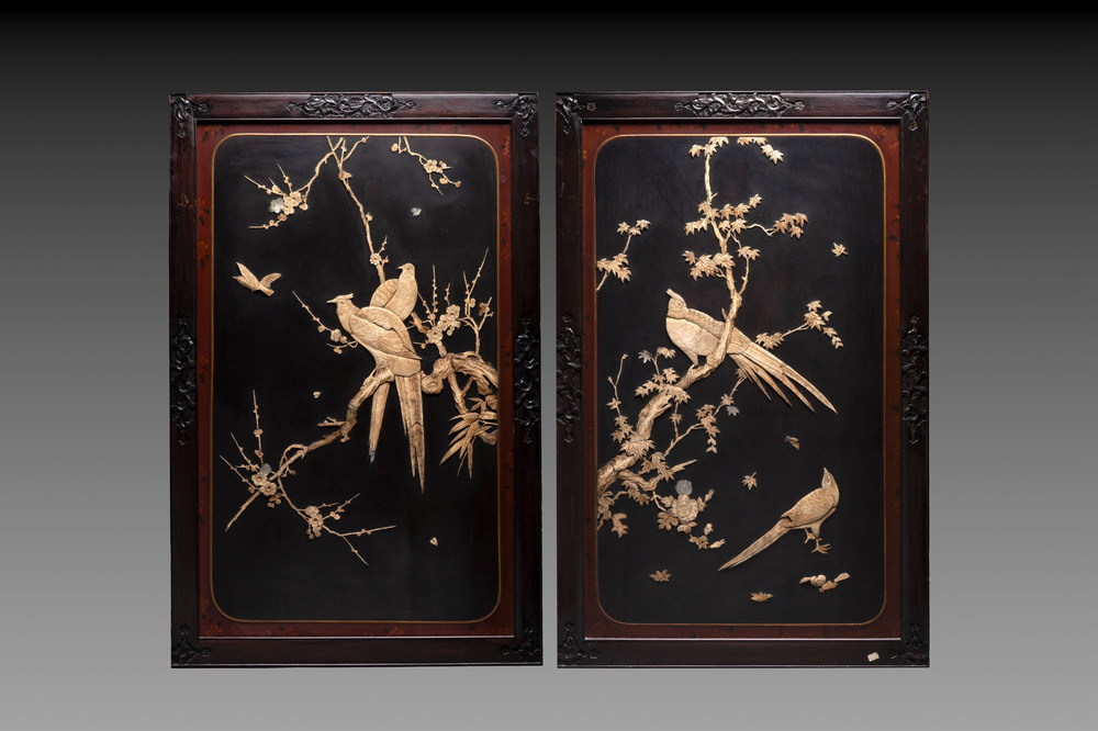 A pair of large Japanese bone-inlaid lacquered wooden panels with birds among flowering branches, 19/20th C.