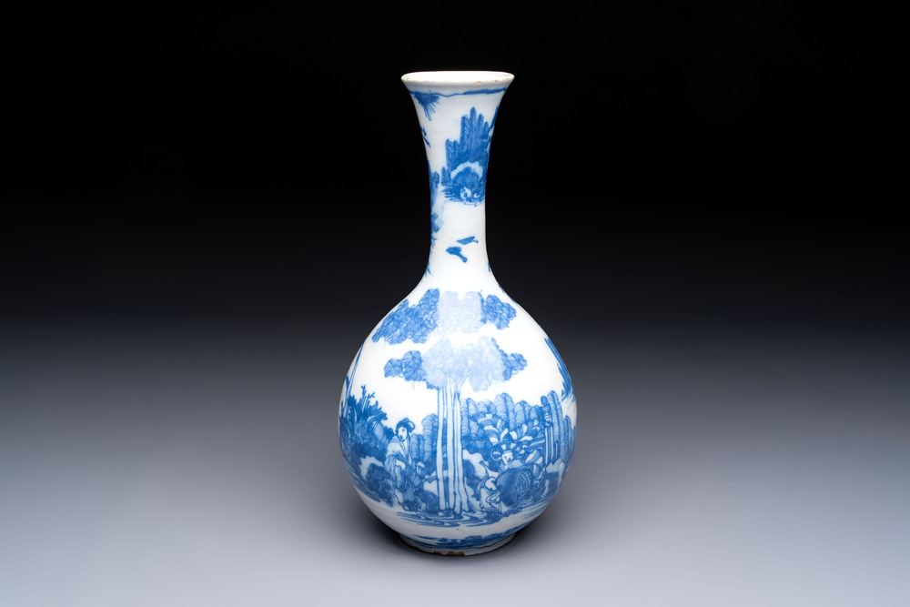 A blue and white Dutch Delft Transitional style chinoiserie bottle vase, late 17th C.