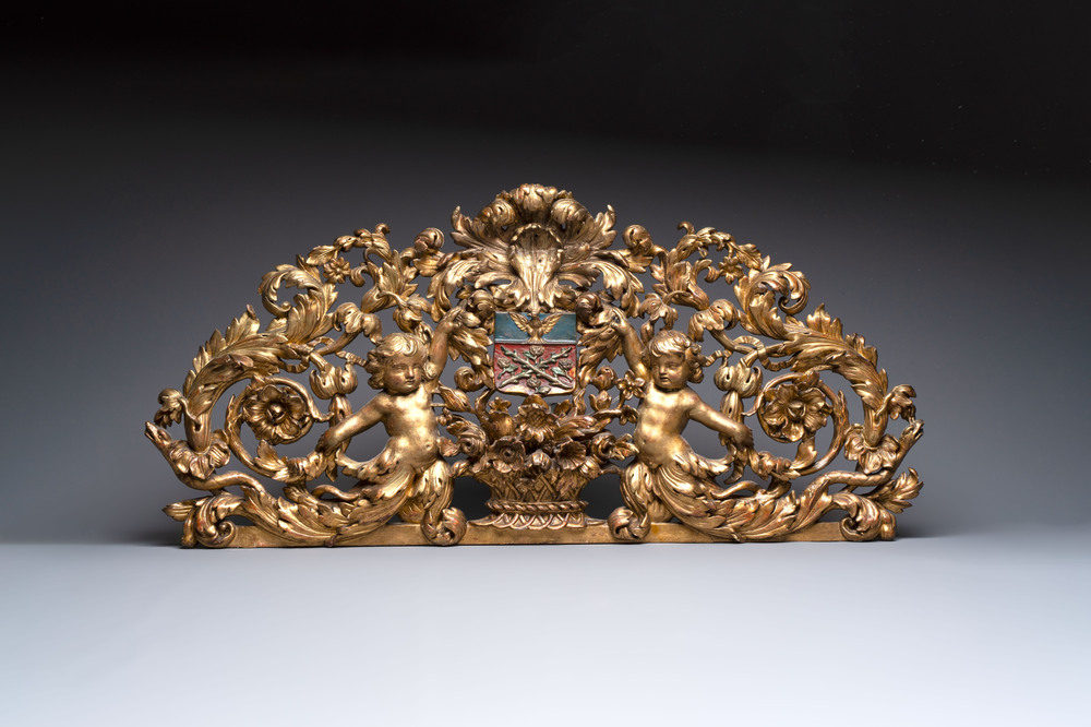 A baroque gilt carved wooden panel with an unidentified family crest, possibly Germany, 18th C.