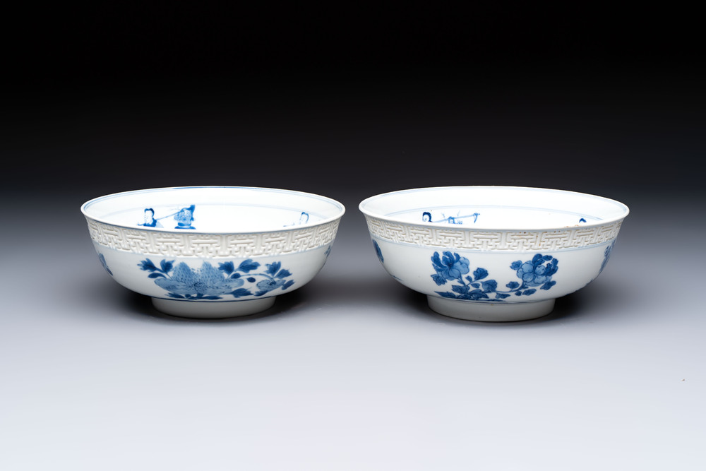 A pair of Chinese blue and white relief-border 'Lan Caihe' bowls, Kangxi