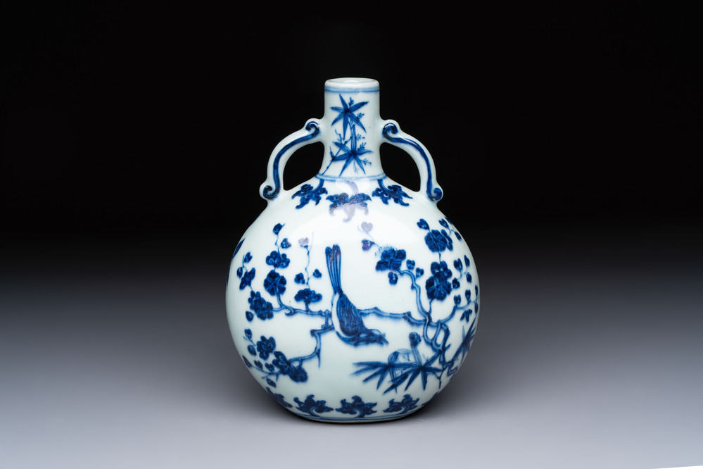 A rare Chinese blue and white 'magpie among flowering branches' moonflask, Yongzheng/Qianlong