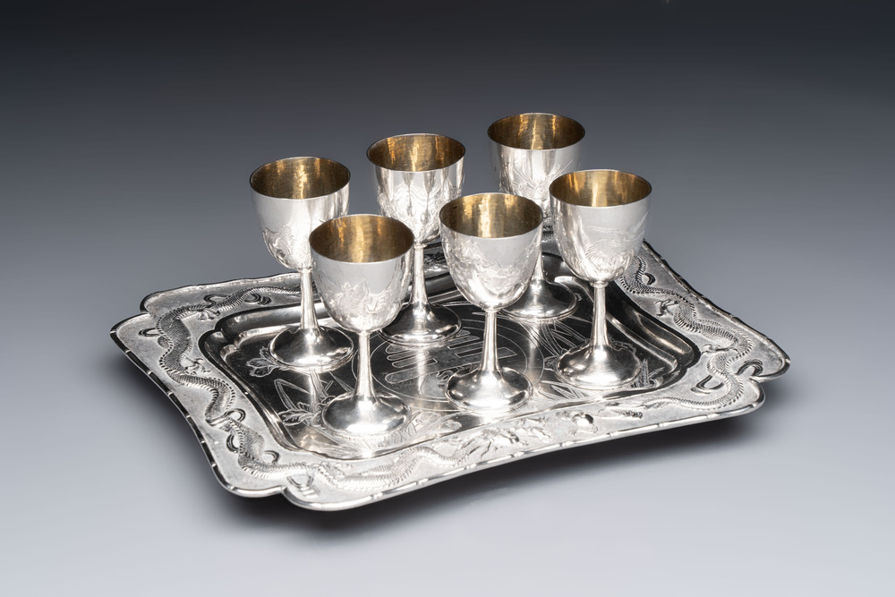 A Chinese silver tray and six gilt-silver cups, 19/20th C.