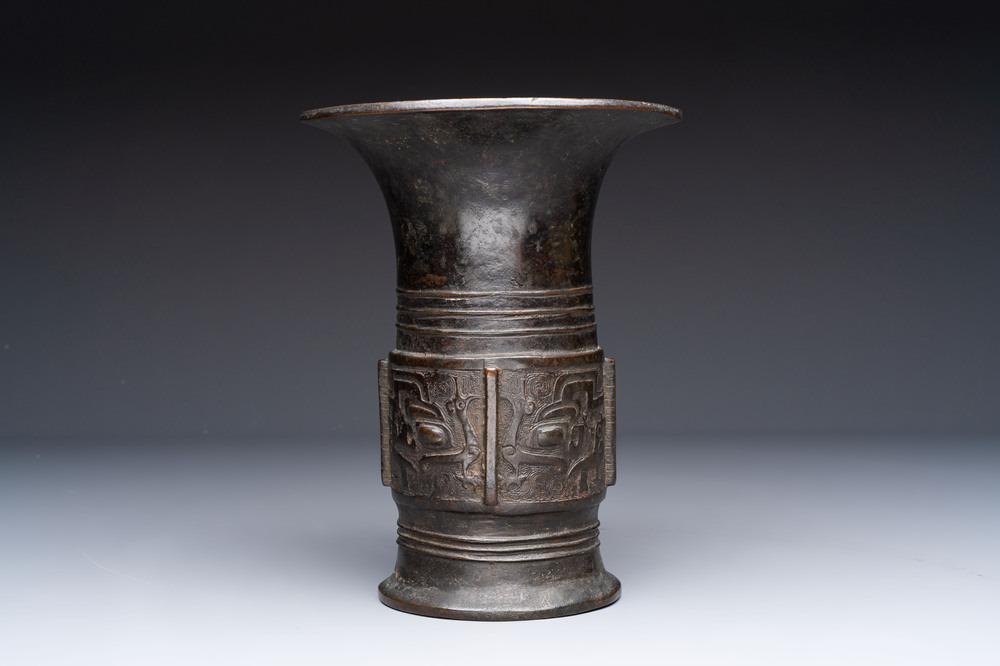 A Chinese archaistic bronze 'zun' vase, Ming