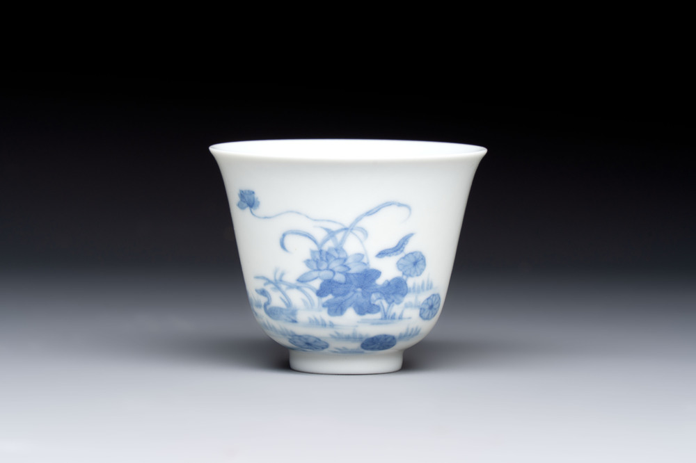 A Chinese blue and white 'mandarin duck and lotus' cup, Kangxi mark, 19th C.