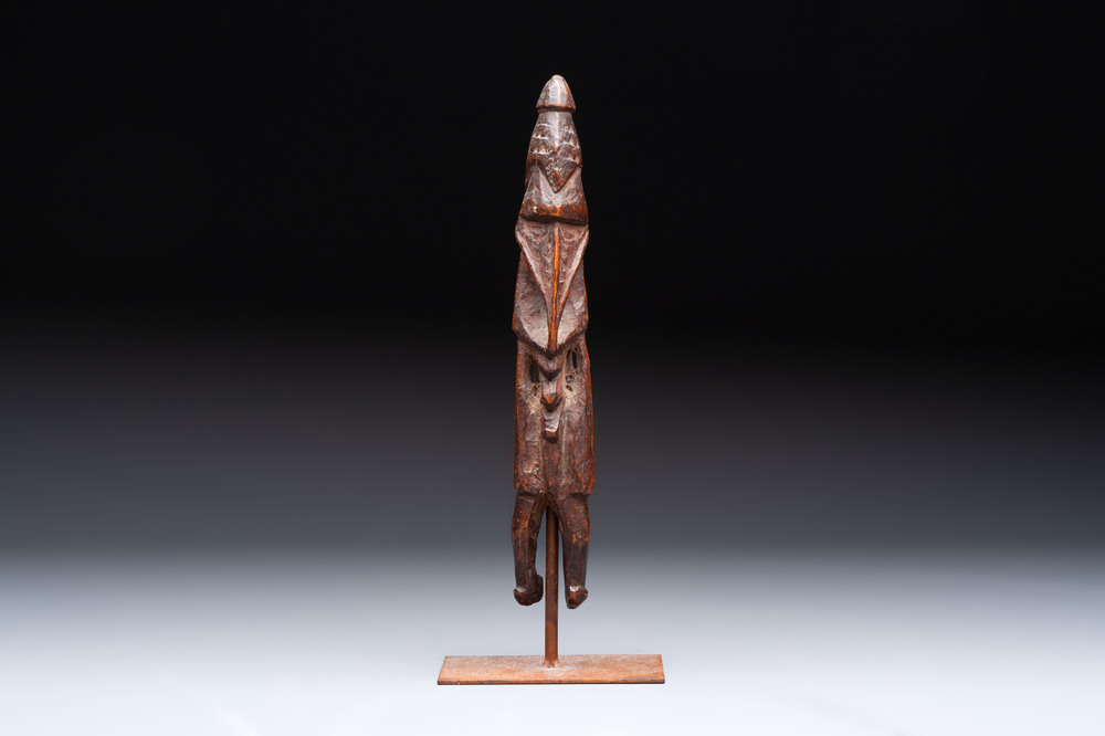 A Sepik Ramu wooden figure, Papua New Guinea