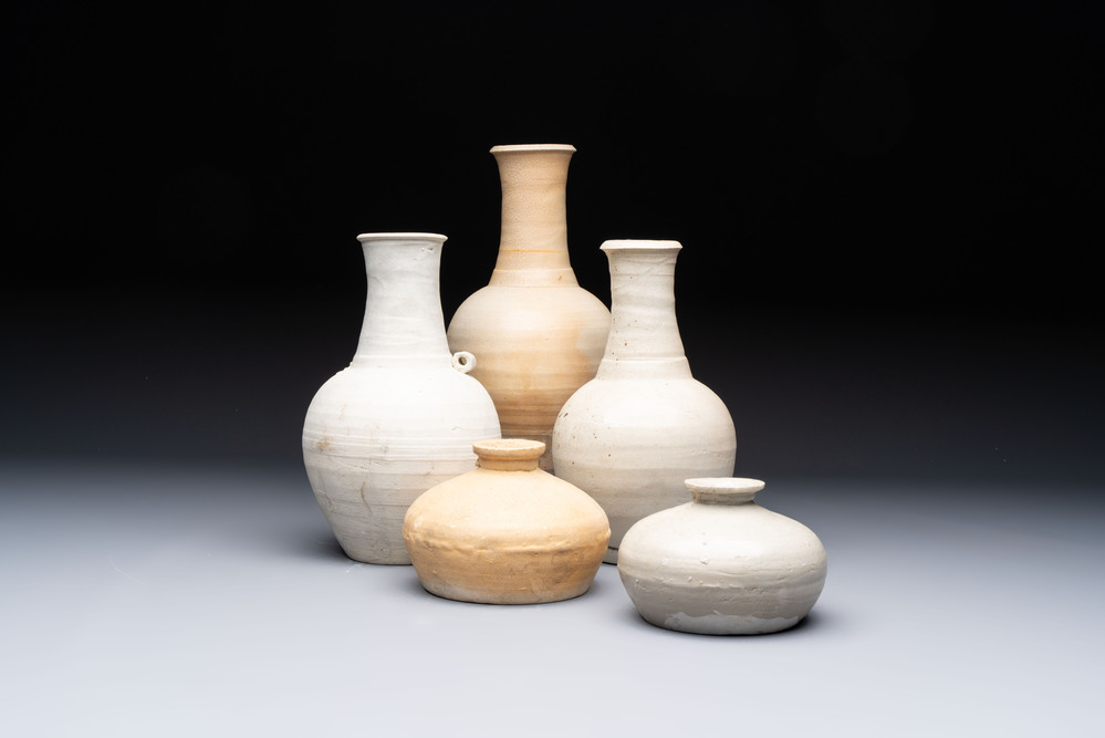 Three cream-glazed bottle vases and two jarlets from the Jepara shipwreck, Dehua or Anxi kilns, Song