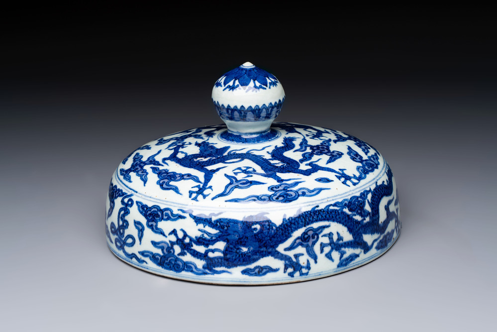 A Chinese blue and white 'dragon among clouds' cover, 20th C.