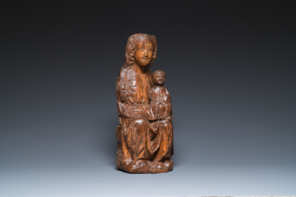 A carved oak 'Sedes Sapientia' or Madonna with child, France, 13/14th C.