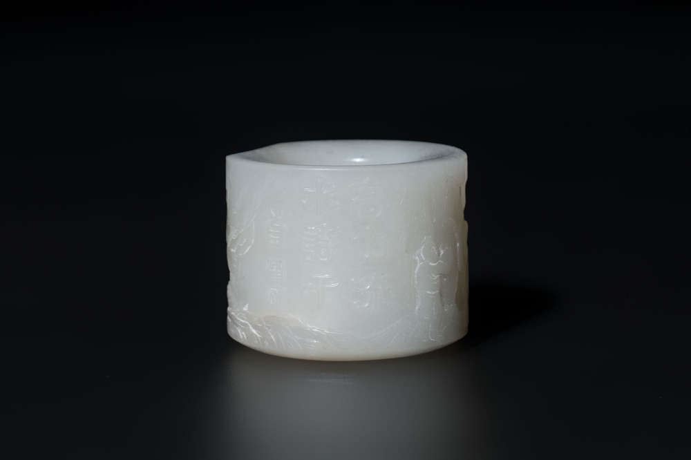 A fine Chinese white jade inscribed archer ring, Zigang 子岡 mark, 18th C.