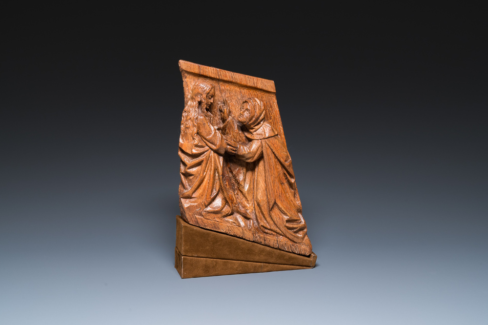 A carved oak retable fragment depicting 'The Visitation', North-Brabant, 15th C.