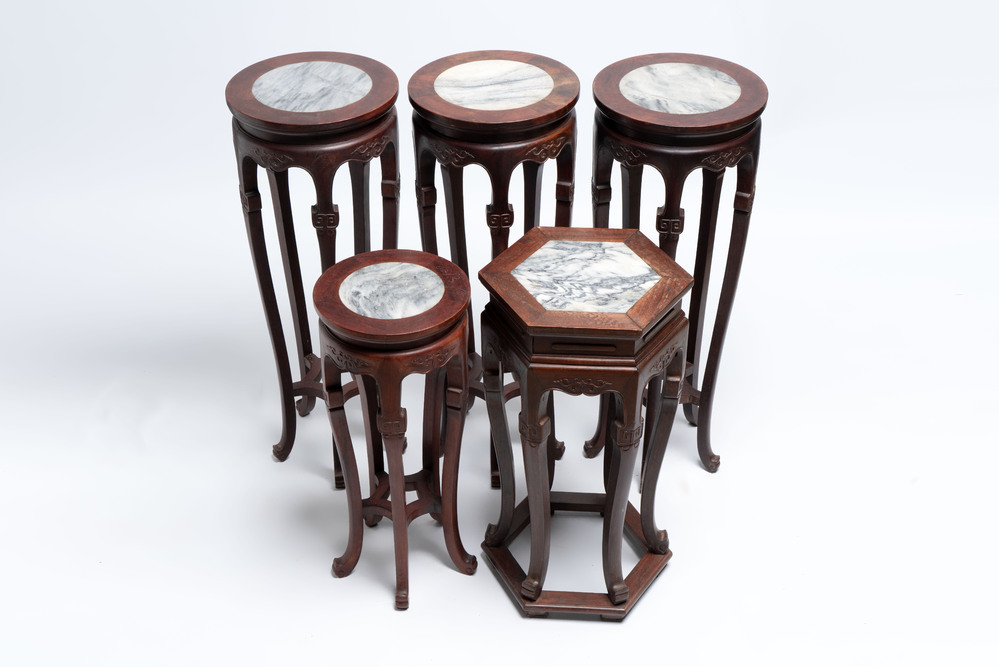 Five Chinese marble-topped hongmu stands, 20th C.