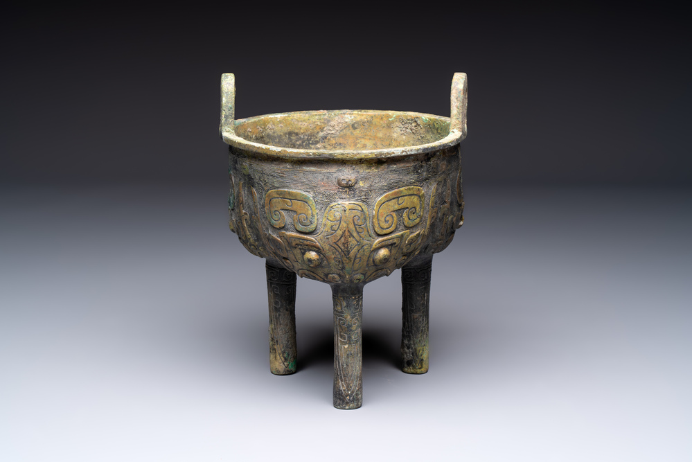 A Chinese archaic bronze food vessel with Taotie design, 'Ding 鼎', late Shang