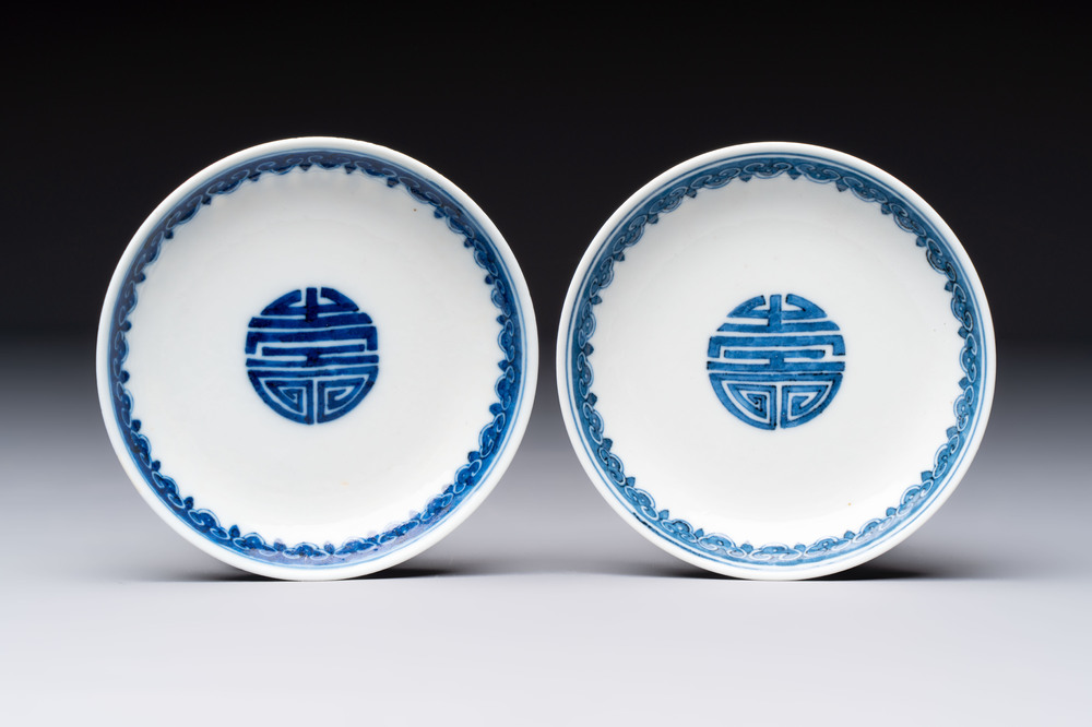 A pair of Chinese blue and white saucer dishes, Qianlong mark, 19th C.