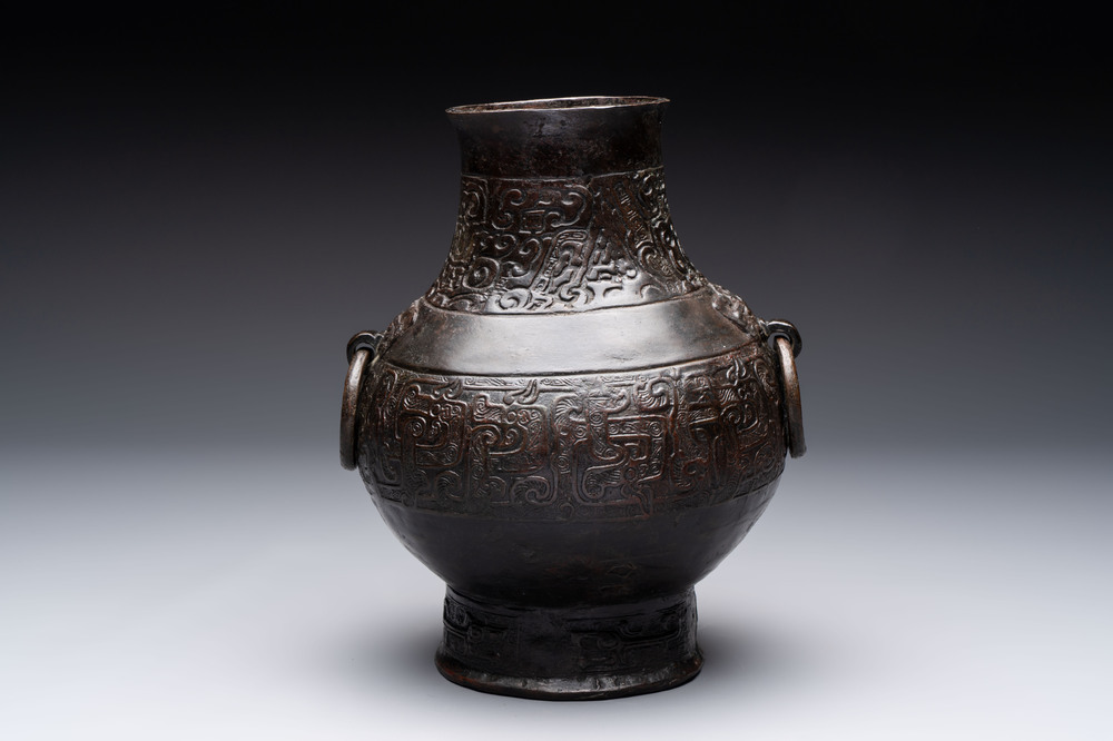 A Chinese archaistic bronze 'hu' vase with chilong design, Song/Yuan