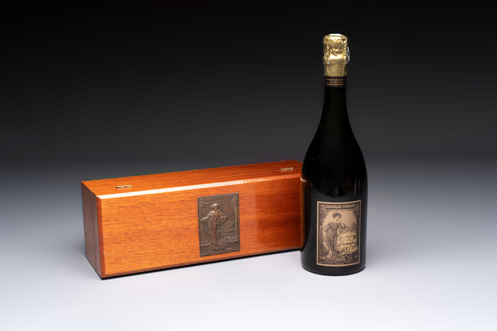 A bottle of Cuv&eacute;e Sp&eacute;ciale Louise Pommery Vintage 1980 Champagne, presented in a commemorative box fitted with a bronze plaque