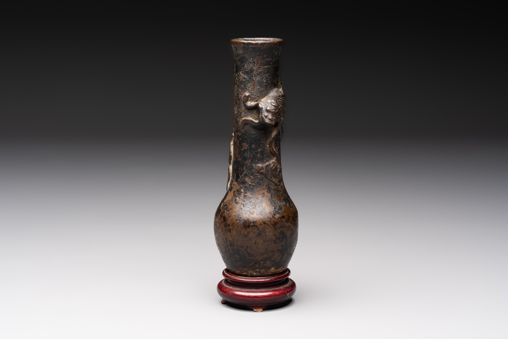 A small Chinese bronze vase with a chilong on a wooden stand, Yuan