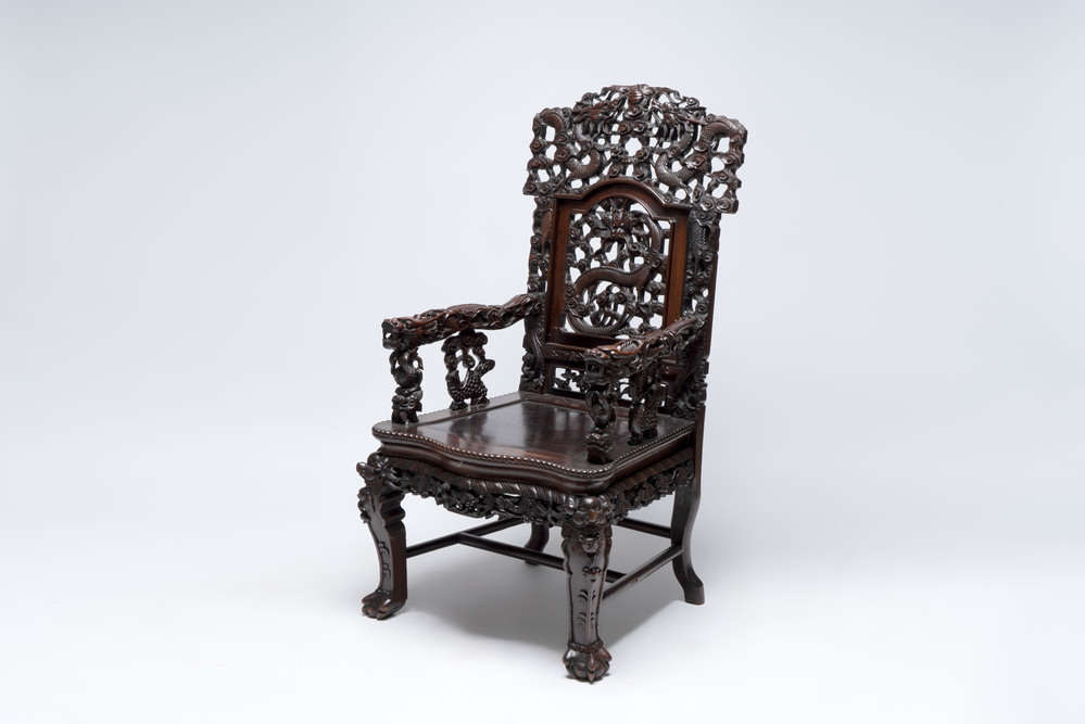 A richly carved Chinese hongmu 'dragon' armchair, Canton, 19th C.