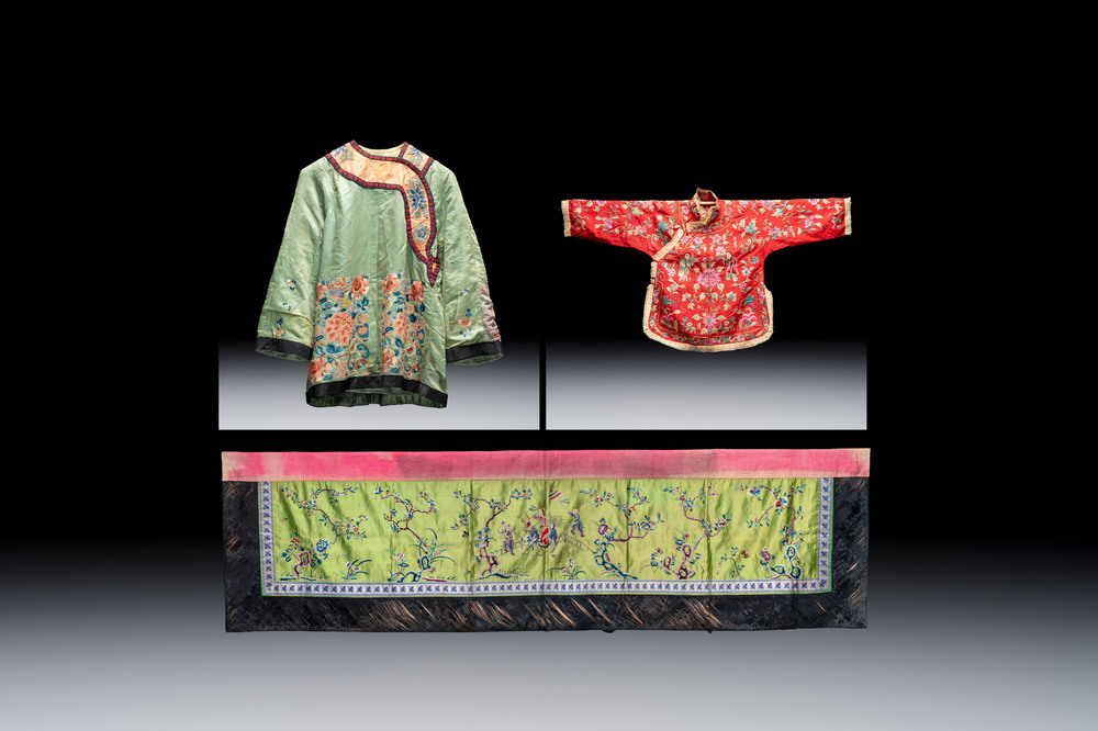 Two Chinese embroidered silk women&rsquo;s robes and an embroidered silk panel, 19th C.