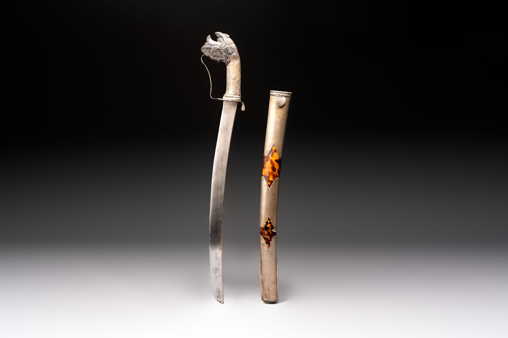 An Indonesian 'pedang palembang' sword with a silver-alloy-mounted and tortoiseshell-veneered scabbard, Sumatra, 19th C.