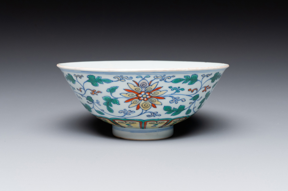 A Chinese doucai 'lotus scroll' bowl, Qianlong mark and of the period