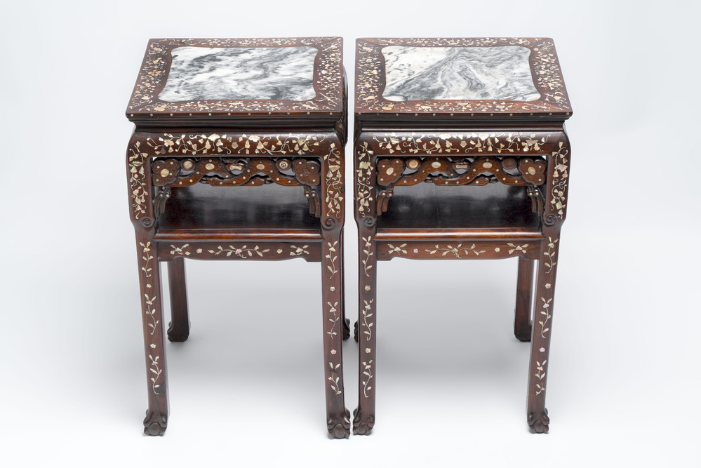 A pair of Chinese hongmu two-tier stands with marble top and mother-of-pearl inlay, Canton, 19th C.