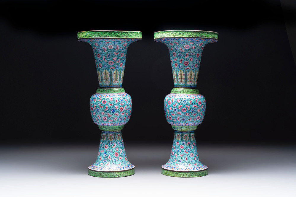 A pair of Chinese Canton enamel 'gu' vases with floral design, Qianlong