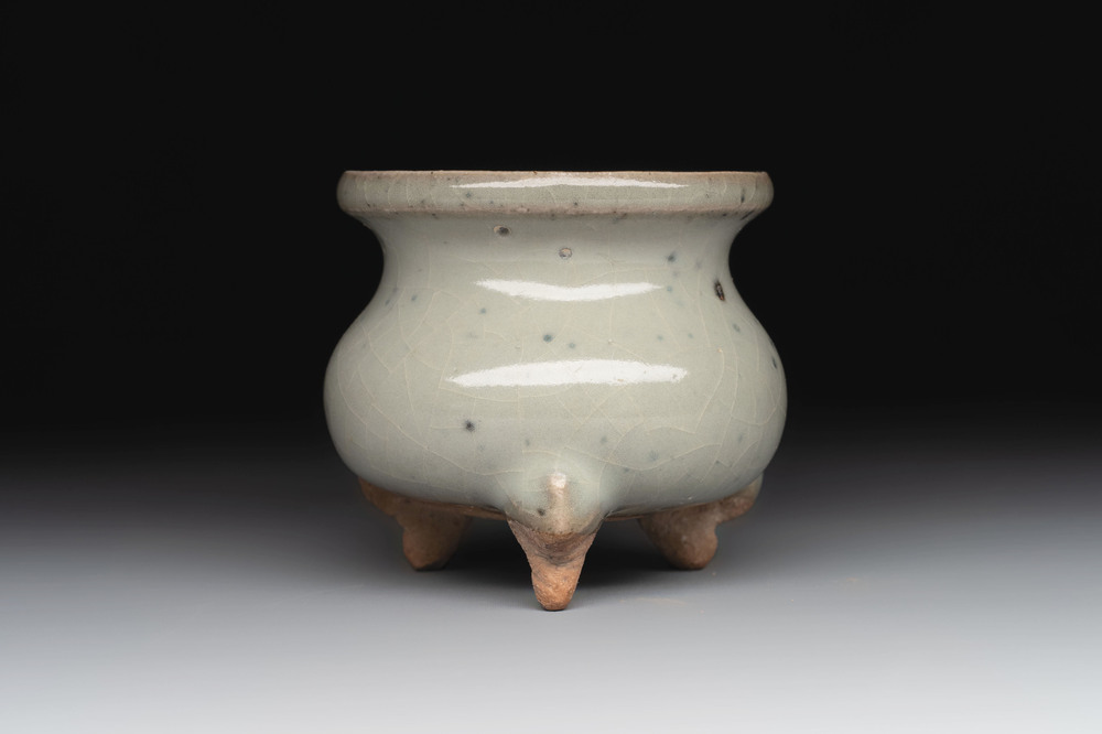 A small Chinese green-glazed 'jun' tripod censer, Hebi kilns, Song/Yuan
