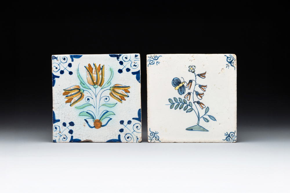 Two polychrome Dutch Delft 'flower' and 'butterfly and flower' tiles, 17th C.