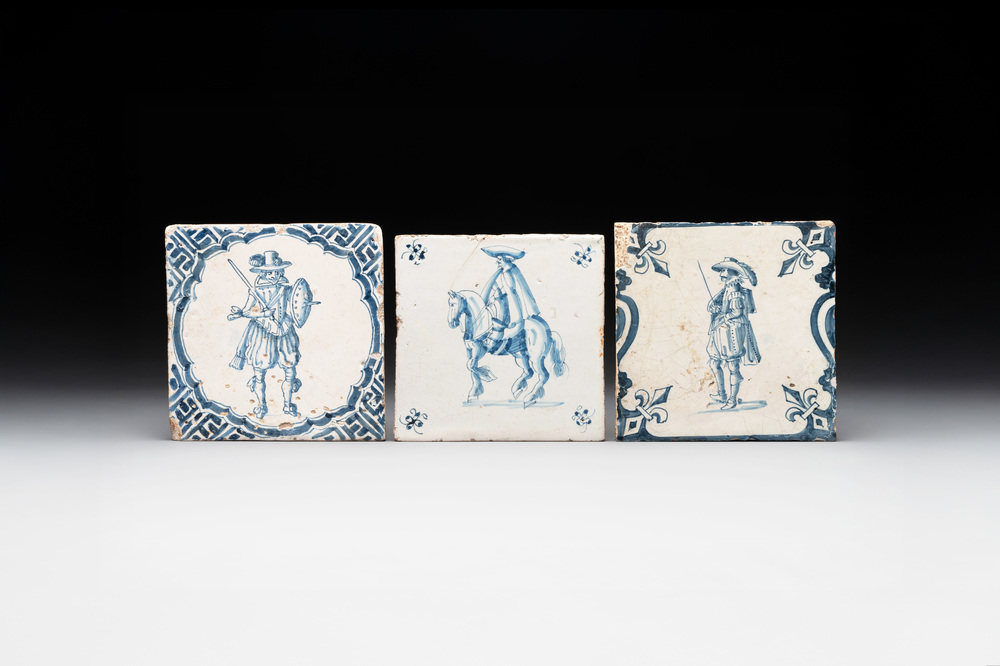 Three fine blue and white Dutch Delft 'soldier' tiles, 17th C.