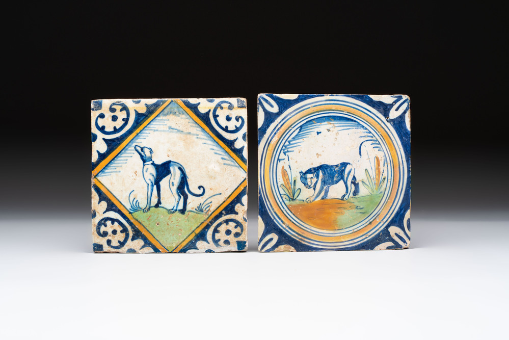 Two polychrome Dutch Delft maiolica 'dog' and 'panther' tiles, late 16th C.