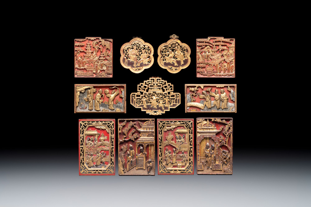 11 Chinese gilt-lacquered carved wooden panels with narrative design, 19th C.