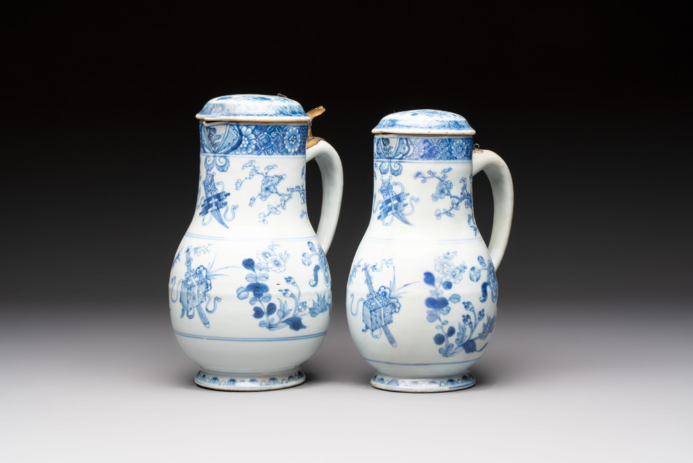 Two Chinese blue and white jugs and cover with floral design, Yongzheng/Qianlong