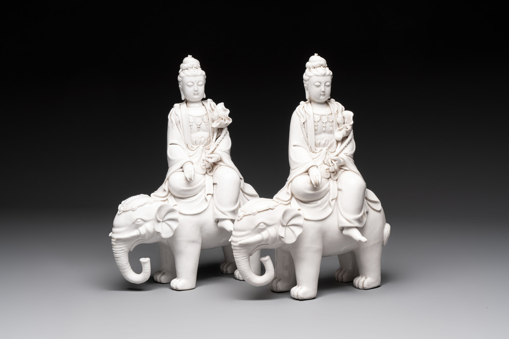 Two Chinese Dehua blanc de Chine sculptures of the Guanyin seated on an elephant, He Chaozong 何朝宗 and Dehua 德化 marks, 20th C.
