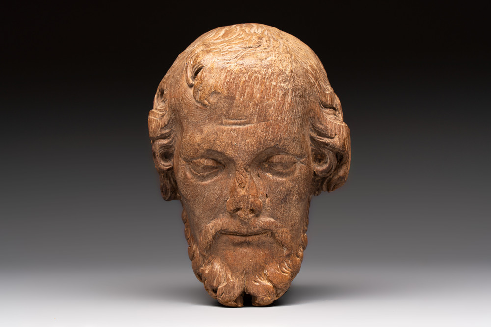 A carved limewood bearded male head, Germany, 18th C.