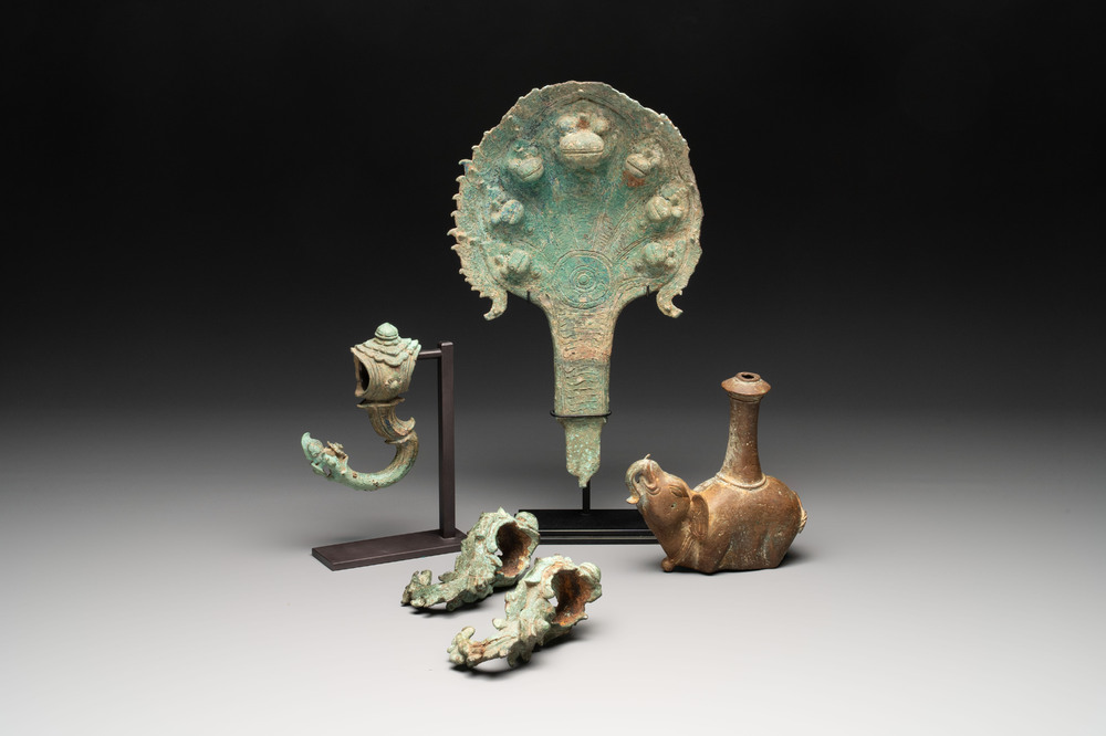 Three palanquin hooks, a bronze sculpture of naga Mucalinda and an elephant-form kendi, Cambodia, 13th C. and earlier