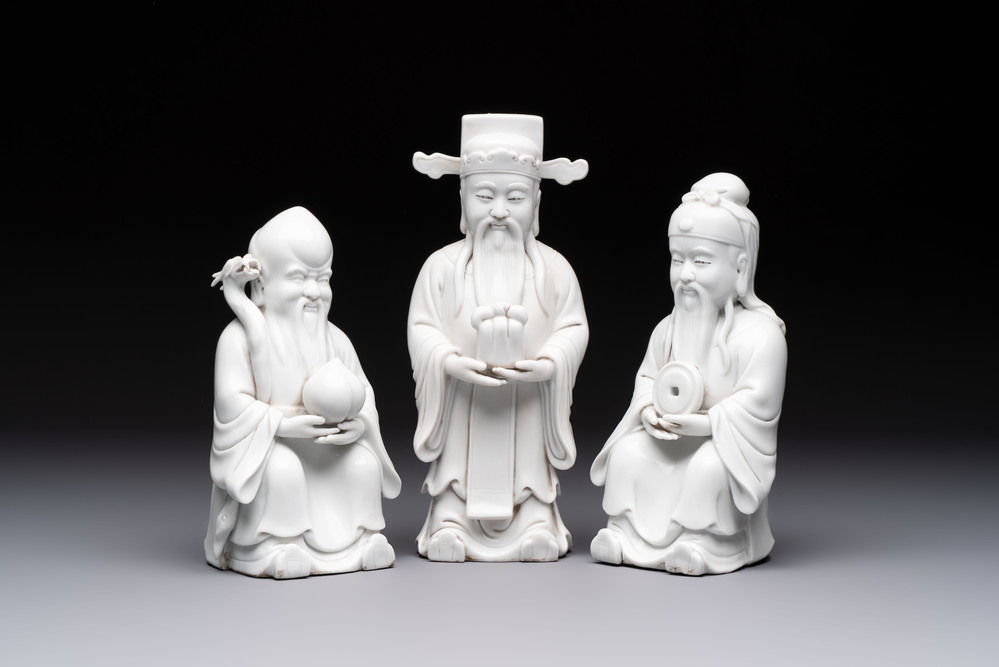 A set of three Chinese Dehua blanc de Chine 'Sanxing' figures, 20th C.