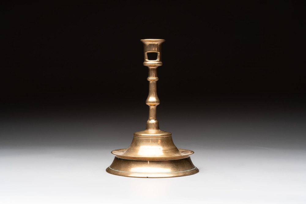 A Flemish or French knotted brass candlestick, 15/16th C.
